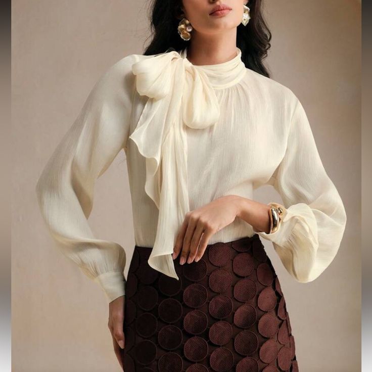 Elegant cream tie neck blouse styling
