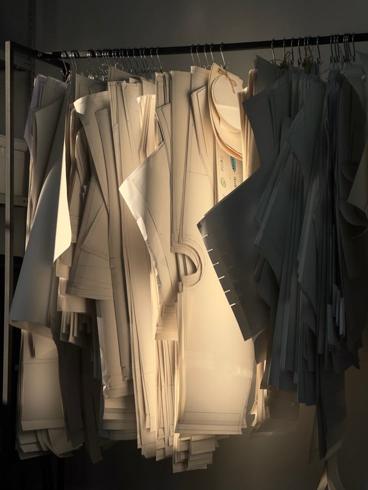 Garment patterns illuminated in the atelier